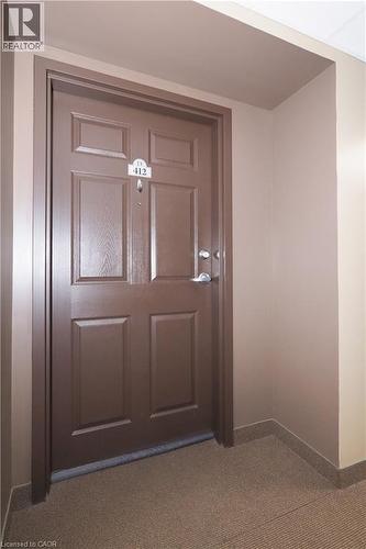 Doorway to suite - 645 St. David Street S Unit# 412, Fergus, ON - Indoor Photo Showing Other Room