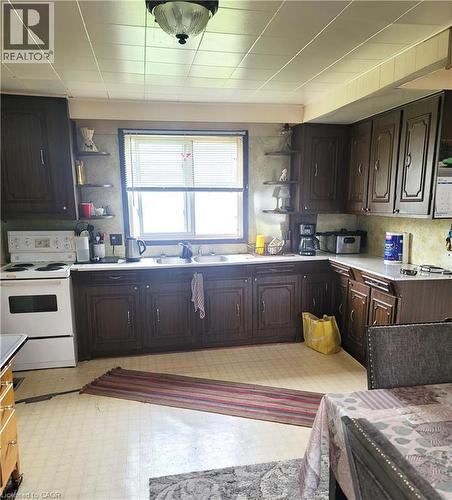 spacious country kitchen - 46 Bridge Street E, Kitchener, ON - Indoor Photo Showing Kitchen With Double Sink