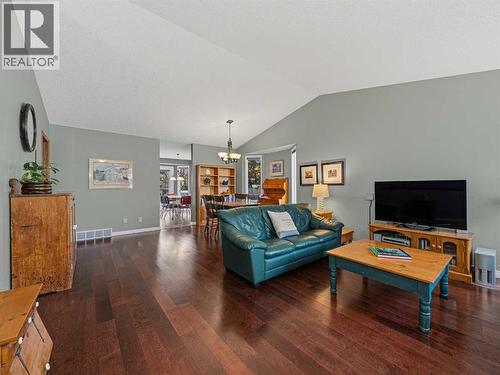 301 Arbour Cliff Close Nw, Calgary, AB - Indoor Photo Showing Living Room