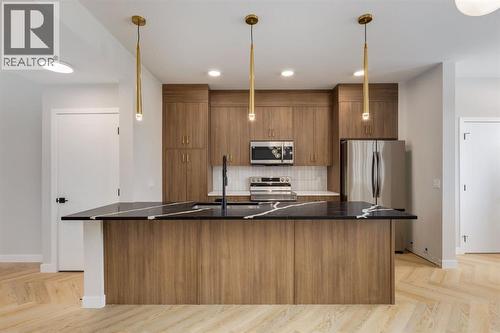 780 Sora Boulevard Se, Calgary, AB - Indoor Photo Showing Kitchen With Upgraded Kitchen