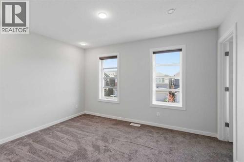 61 Savanna Link Ne, Calgary, AB - Indoor Photo Showing Other Room