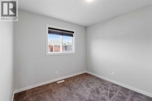 61 Savanna Link Ne, Calgary, AB - Indoor Photo Showing Other Room