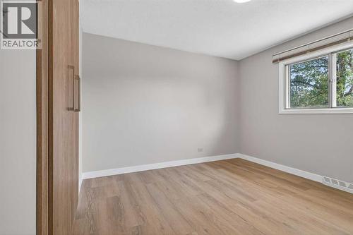 Primary Bedroom - 5923 Centre Street Nw, Calgary, AB - Indoor Photo Showing Other Room