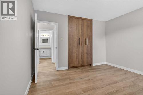 Primary Bedroom - 5923 Centre Street Nw, Calgary, AB - Indoor Photo Showing Other Room