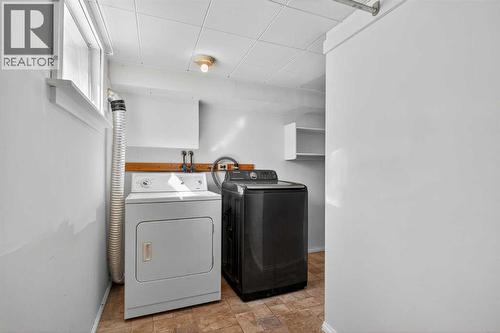 Laundry - 5923 Centre Street Nw, Calgary, AB - Indoor Photo Showing Laundry Room