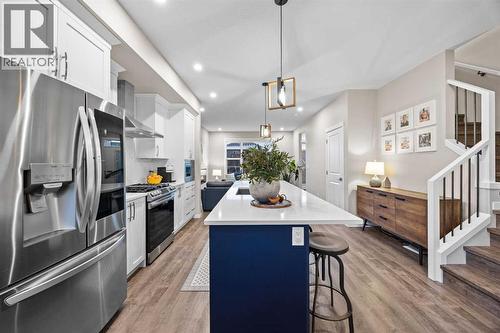 Kitchen - 80 Wolf Gate, Okotoks, AB - Indoor Photo Showing Kitchen With Upgraded Kitchen