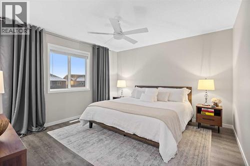 Primary Bedroom - 80 Wolf Gate, Okotoks, AB - Indoor Photo Showing Bedroom