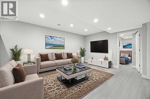 Basement Living Room - 80 Wolf Gate, Okotoks, AB - Indoor Photo Showing Living Room