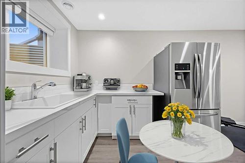 80 Wolf Gate, Okotoks, AB - Indoor Photo Showing Dining Room