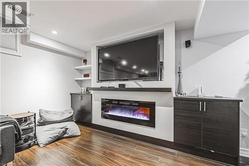 8 Matteo Trail, Hamilton, ON - Indoor Photo Showing Living Room With Fireplace