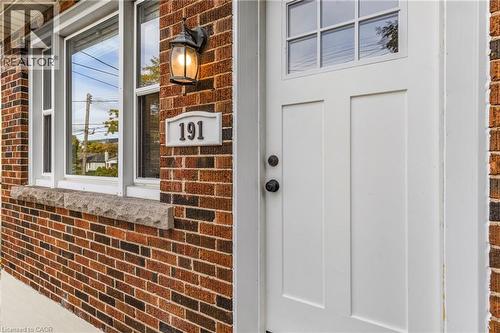 View of exterior entry featuring brick siding - 191 East 11Th Street, Hamilton, ON -  With Exterior