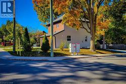 View of side of property featuring mail area - 