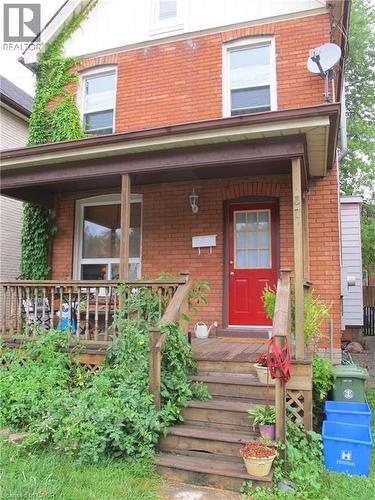 Doorway to property with brick siding and covered porch - 37 Dundas Street, Dundas, ON - Outdoor With Deck Patio Veranda With Exterior