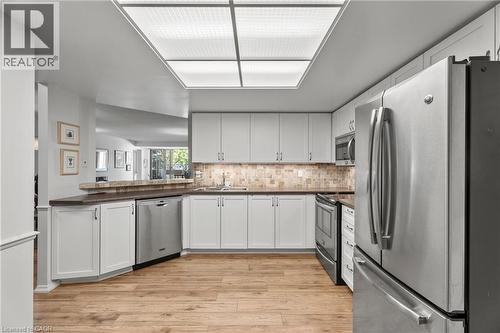 1201 North Shore Boulevard E Unit# 302, Burlington, ON - Indoor Photo Showing Kitchen With Upgraded Kitchen