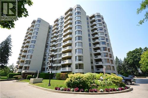 1201 North Shore Boulevard E Unit# 302, Burlington, ON - Outdoor With Balcony With Facade