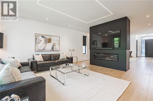 135 Eleanor Avenue, Hamilton, ON - Indoor Photo Showing Living Room With Fireplace