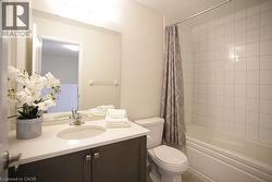 Bathroom with shower / tub combo and vanity - 