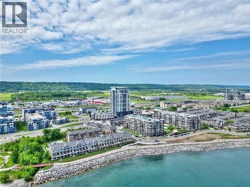 Waterfront trail and beach - 385 Winston Road Unit# 1807, Grimsby, ON - Outdoor With Body Of Water With View