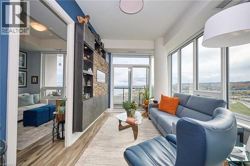 385 Winston Road Unit# 1807, Grimsby, ON - Indoor Photo Showing Living Room With Fireplace