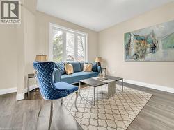 Living room with wood finished floors - 