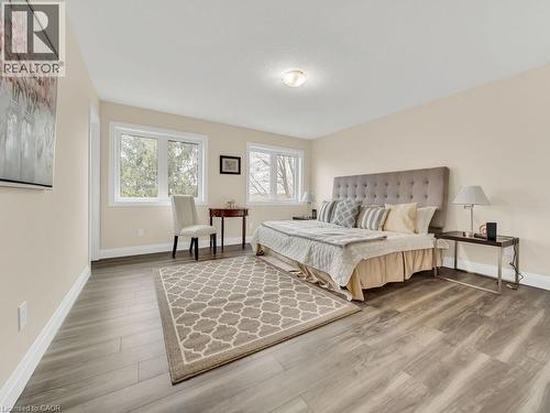 Bedroom with baseboards and wood finished floors - 256 W King Street, Ingersoll, ON - Indoor Photo Showing Bedroom
