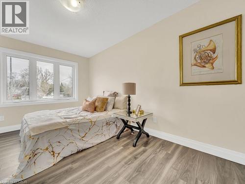 Bedroom featuring wood finished floors and vaulted ceiling - 256 W King Street, Ingersoll, ON - Indoor Photo Showing Bedroom