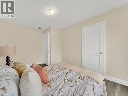 Bedroom featuring baseboards and wood finished floors - 256 W King Street, Ingersoll, ON - Indoor Photo Showing Bedroom