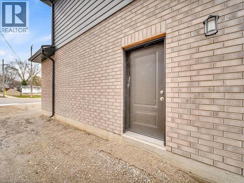 View of exterior entry for BASEMENT APARTMENT - 256 W King Street, Ingersoll, ON - Outdoor With Exterior