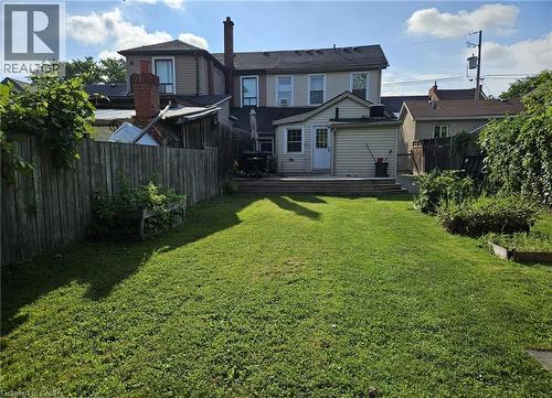 Fenced backyard with a deck - 253 Mary Street, Hamilton, ON - Outdoor