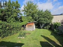 View of yard with a shed - 