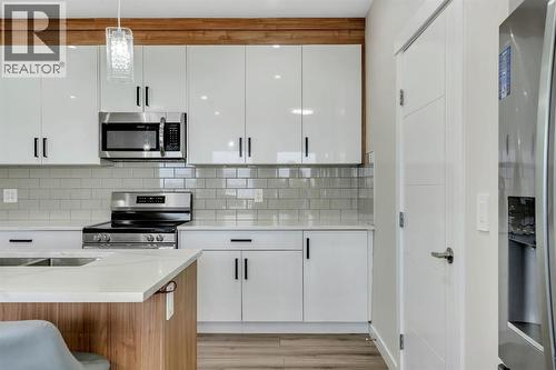 1222 Westmount Drive, Strathmore, AB - Indoor Photo Showing Kitchen With Double Sink With Upgraded Kitchen