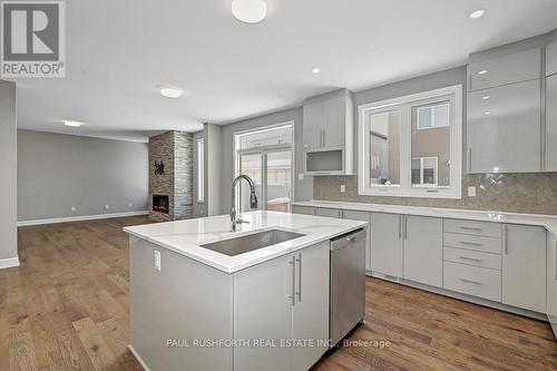 Virtually Staged-Kitchen Eating Area - 147 Aquarium Avenue, Ottawa, ON - Indoor Photo Showing Dining Room With Fireplace
