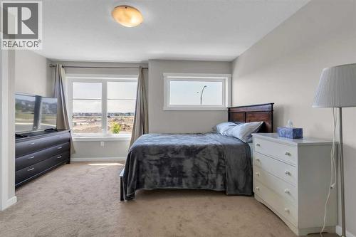 142 Red Embers Gate Ne, Calgary, AB - Indoor Photo Showing Bedroom