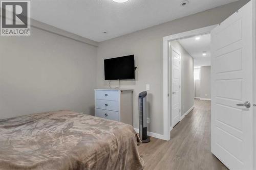 142 Red Embers Gate Ne, Calgary, AB - Indoor Photo Showing Bedroom