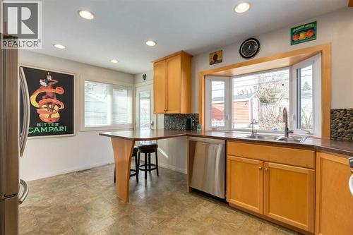 55 Heston Street Nw, Calgary, AB - Indoor Photo Showing Kitchen With Double Sink