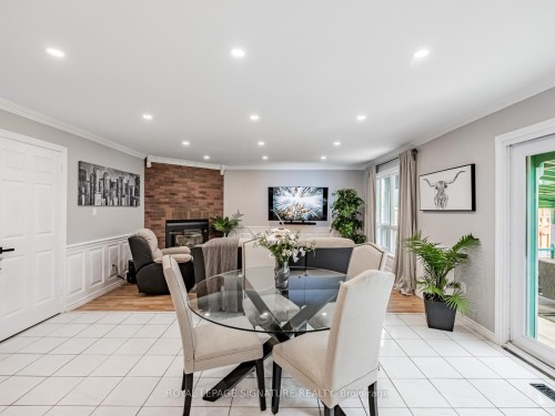 5245 Champlain Trail, Mississauga, ON - Indoor Photo Showing Dining Room With Fireplace