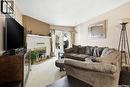 114 Cedar Meadow Drive, Regina, SK  - Indoor Photo Showing Living Room With Fireplace 
