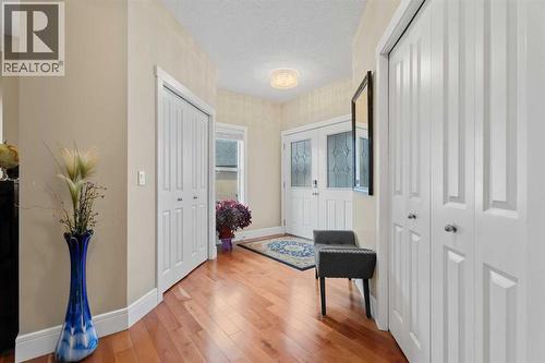 Large foyer with two closets - 113 Aspen Stone Place Sw, Calgary, AB - Indoor Photo Showing Other Room