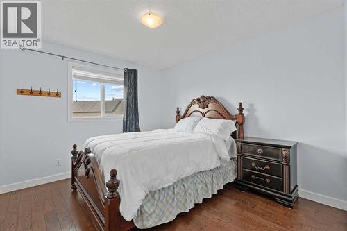 Bedroom 3 - 113 Aspen Stone Place Sw, Calgary, AB - Indoor Photo Showing Bedroom