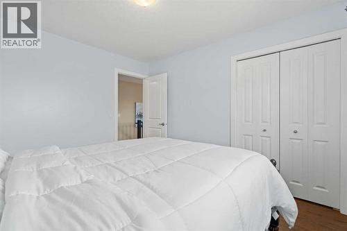 Bedroom 3 - 113 Aspen Stone Place Sw, Calgary, AB - Indoor Photo Showing Bedroom