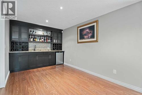 Wet bar in the basement - 113 Aspen Stone Place Sw, Calgary, AB - Indoor