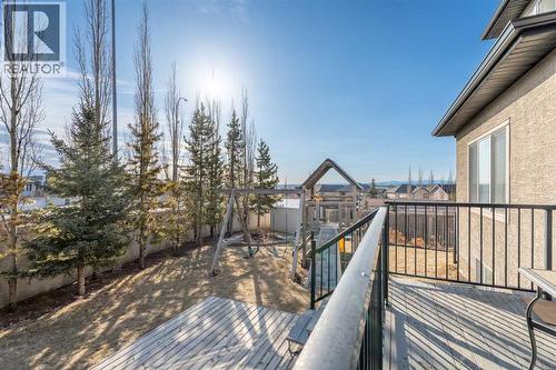 Winter views of the mountains off the deck - 113 Aspen Stone Place Sw, Calgary, AB - Outdoor
