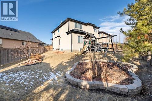 The yard is a huge pie lot - 113 Aspen Stone Place Sw, Calgary, AB - Outdoor