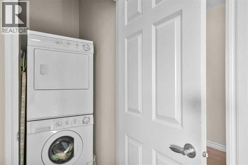 90 Discovery Ridge Gardens Sw, Calgary, AB - Indoor Photo Showing Laundry Room