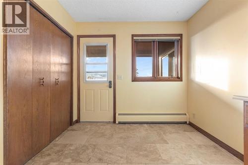 39 Coach Gate Way Sw, Calgary, AB - Indoor Photo Showing Other Room