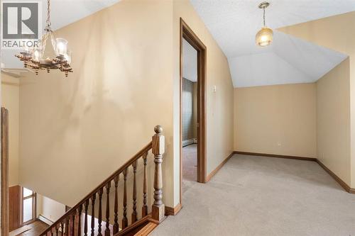 39 Coach Gate Way Sw, Calgary, AB - Indoor Photo Showing Other Room