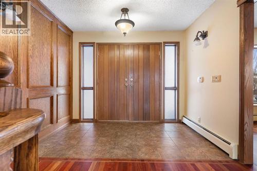 39 Coach Gate Way Sw, Calgary, AB - Indoor Photo Showing Other Room