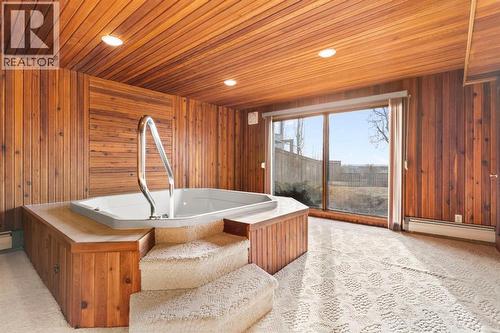 39 Coach Gate Way Sw, Calgary, AB - Indoor Photo Showing Other Room