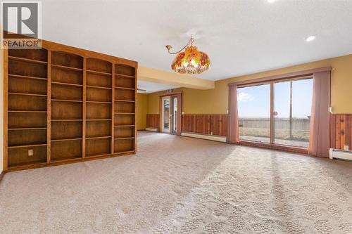 39 Coach Gate Way Sw, Calgary, AB - Indoor Photo Showing Other Room