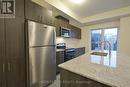 16 - 10 Liben Way, Toronto, ON  - Indoor Photo Showing Kitchen With Upgraded Kitchen 